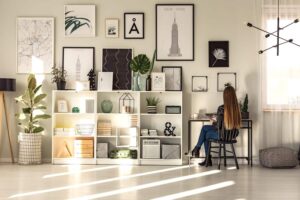a young lady sitting at her office desk working-Home Office Cabinets with Built-In Desks- Smart Designs That Save Space and Improve Productivity- Professional Designs in Dallas-white-home-office.jpg